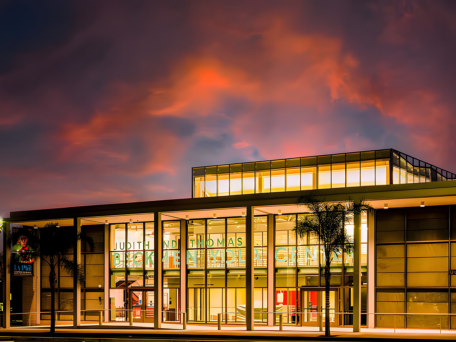 Beckmen YOLA Center, Inglewood — the hall lit from within at dusk