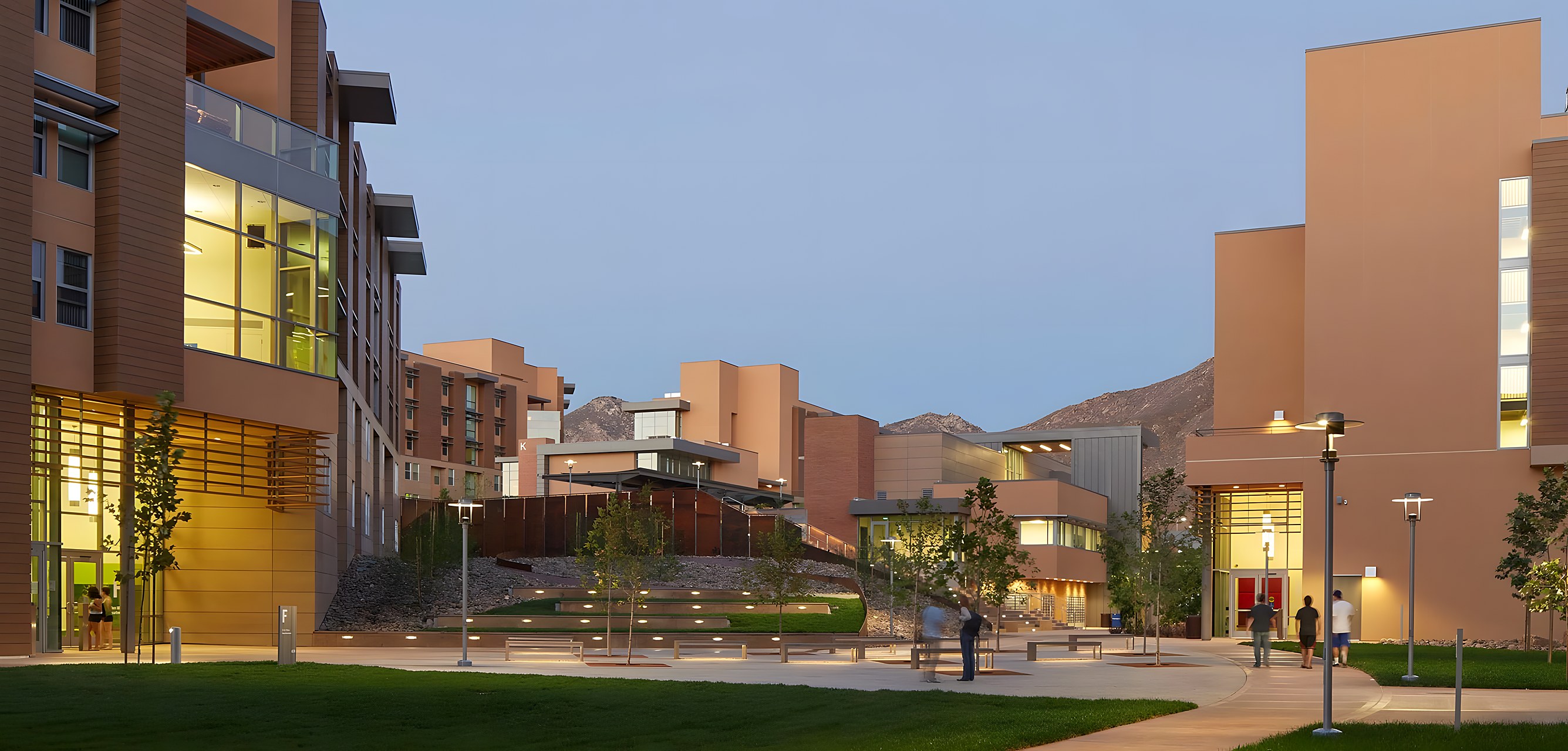 UCR Glen Mor II student housing, Riverside — the residential courtyard at dusk